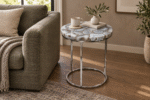 Agate stone top end table beside a sofa in a contemporary living room