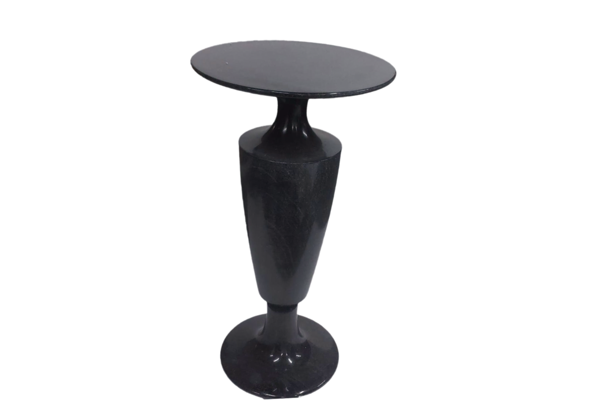 Black modern pedestal table with sleek design