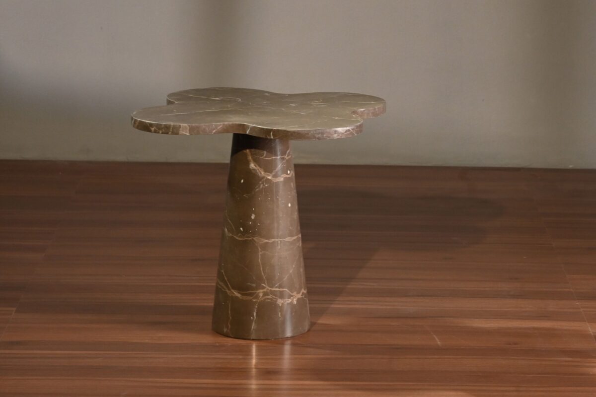 Modern marble side table on wooden floor from Signature living Furniture & Decor
