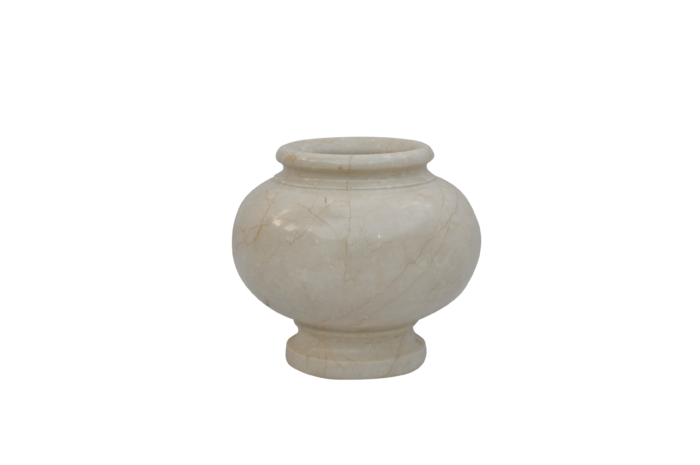 Elegant beige marble vase on black background