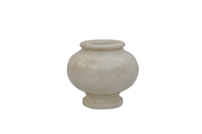 Elegant beige marble vase on black background