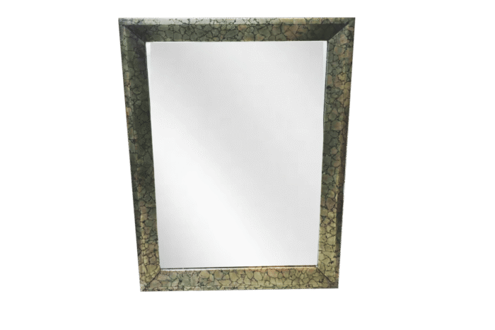Pyrite Stone Mirror Frame Antique rectangular mirror with ornate frame.