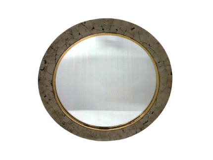 Round vintage mirror with decorative gold trim.