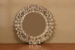 Elegant round decorative mirror with intricate design
