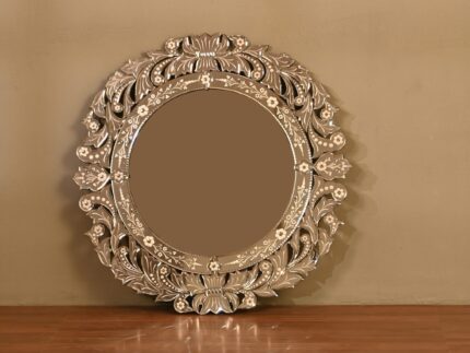 Elegant round decorative mirror with intricate design