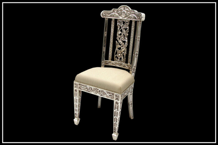 Silver chair by signature living furniture and decor Dubai