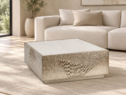 Metal cladded coffee table with Banswara stone top in an elegant neutral interior
