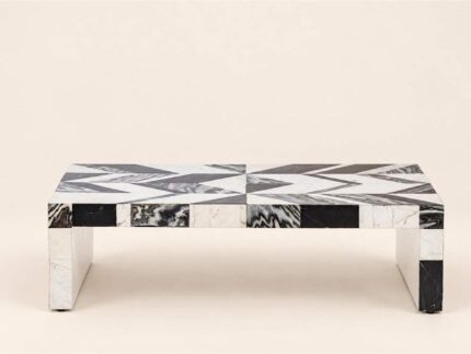 Rectangular black-and-white stone inlay coffee table with geometric top and block legs
